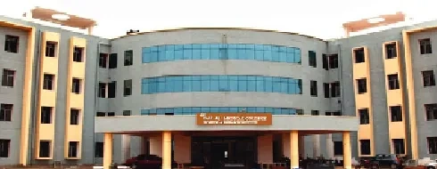 The multi-storey glass-and-cream facade of Sree Balaji Medical College and Hospital in Chrompet, its entrance canopy over the main doors