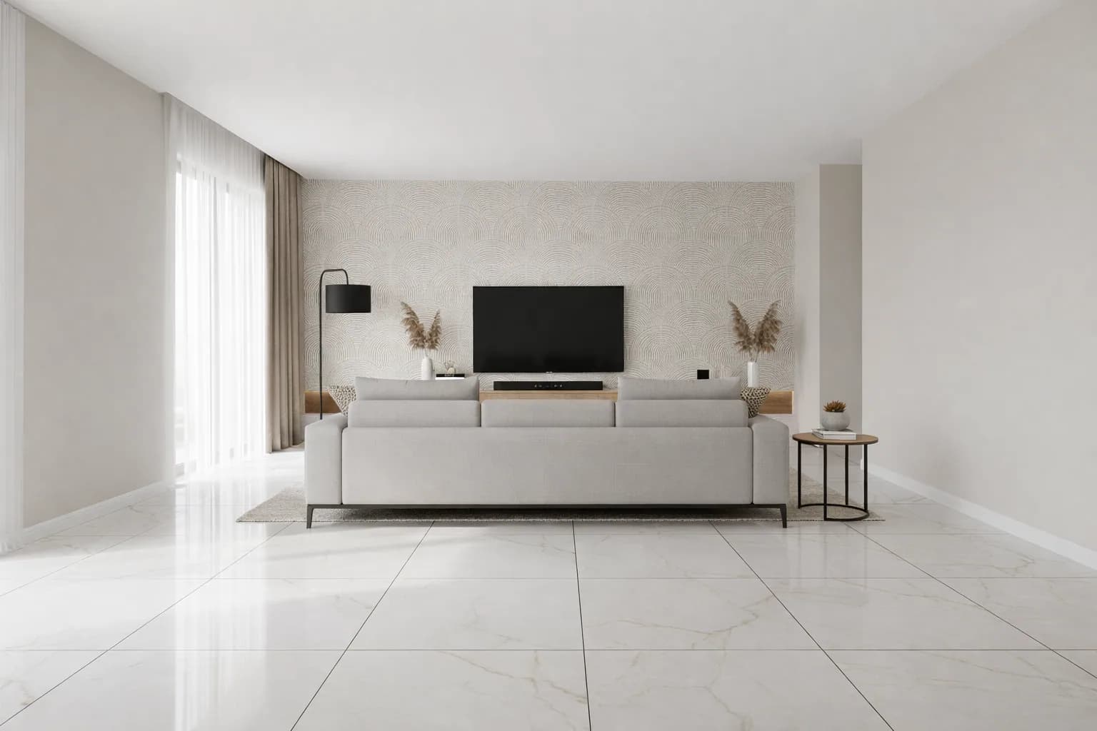 Minimalist living room in cream large-format marble-look floor tile, with a patterned accent wall behind a grey sofa