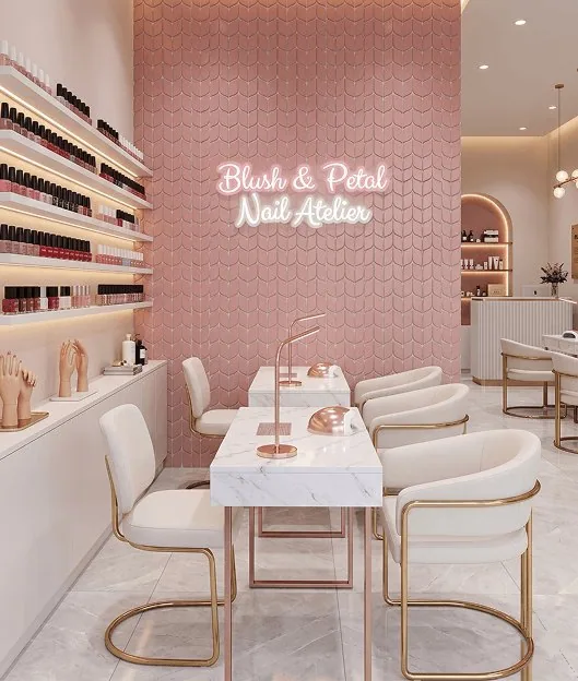 Nail salon in grey marble-look floor tile, with a pink scalloped feature wall