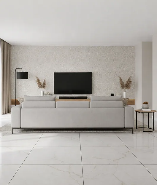 A patterned wall panel frames the television above a gold-veined white floor