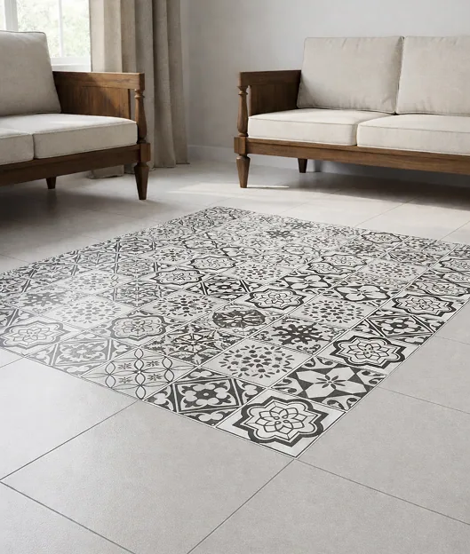 A panel of patterned tile is laid like a rug between two sofas