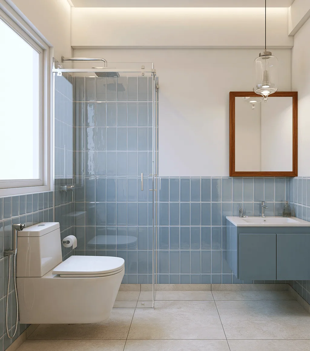 Bathroom with slate-blue rectangular wall tile, a glass shower enclosure and a wall-hung toilet