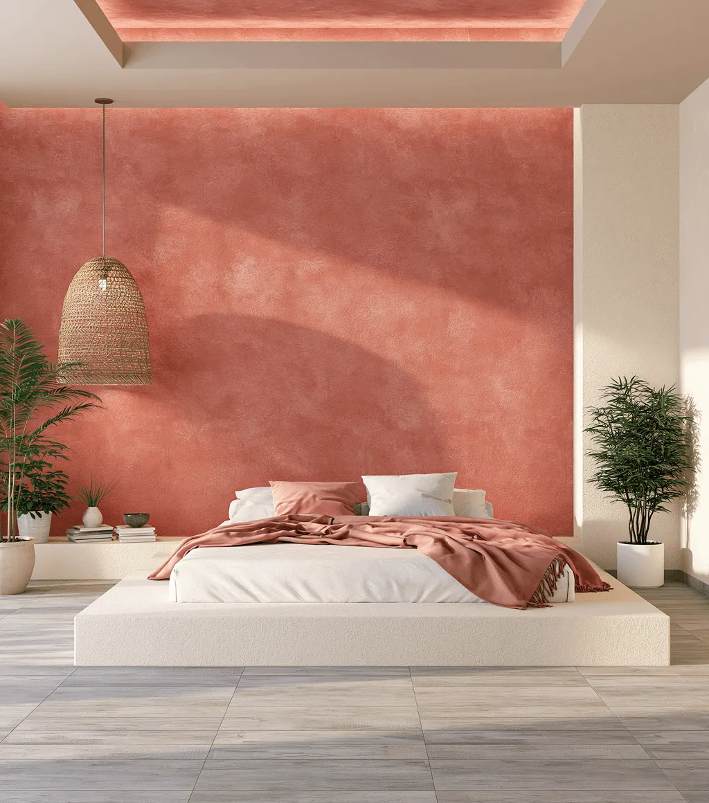 Bedroom floor in light grey wood-look plank tile, with a terracotta accent wall behind a floating bed