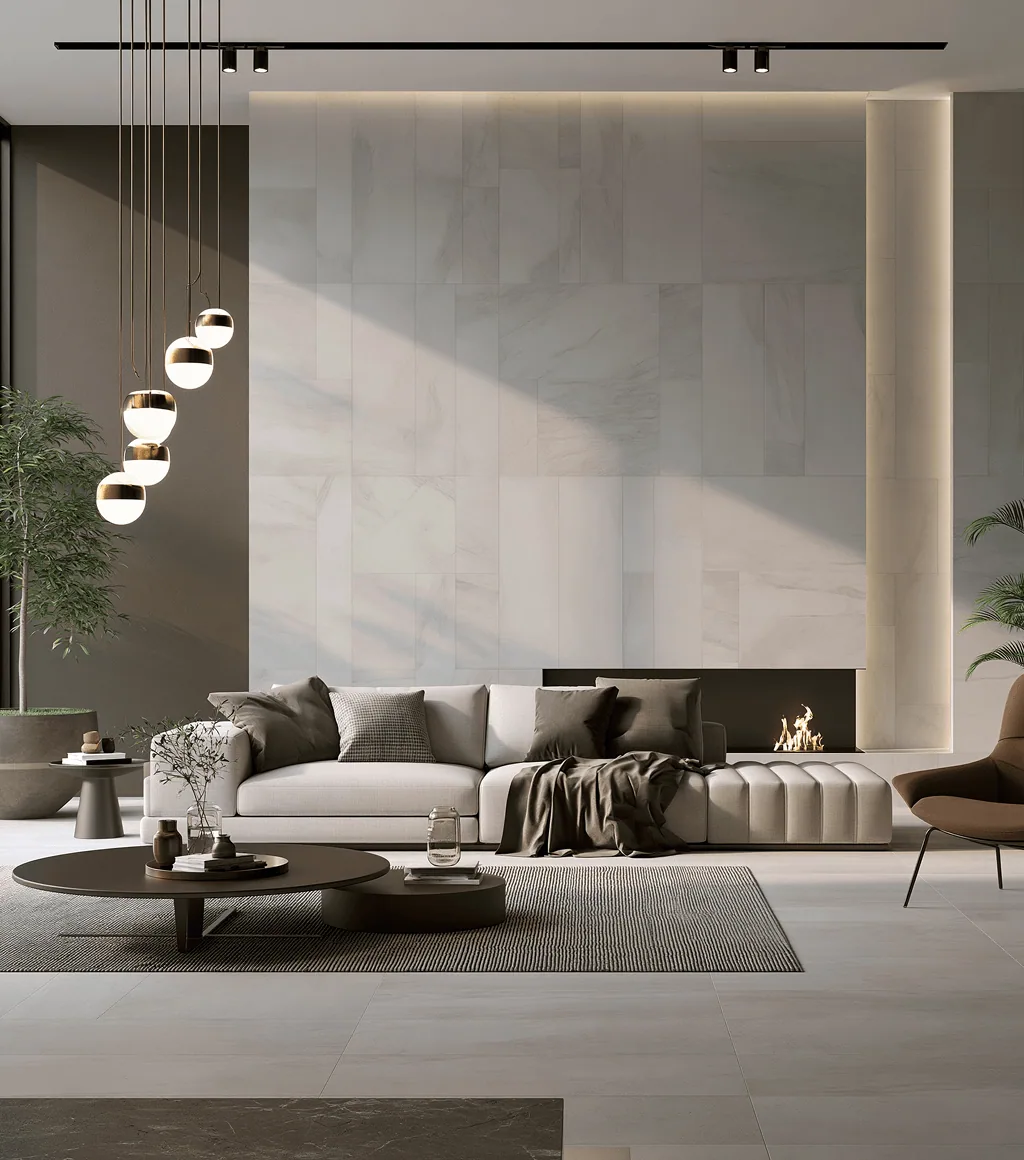 Minimalist living room with a light grey stone-look floor and matching feature wall around a built-in fireplace